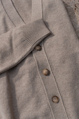 CARDIGAN 4 BOTTONI CON SPALLA SCESA